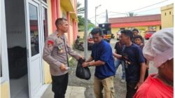 Peringatan HUT Bhayangkara Ke- 80 Kabag Ops Polres Pelabuhan Belawan Gelar Pembagian  Sembako Kepada Masyarakat Sekitar di Mako Polres Belawan